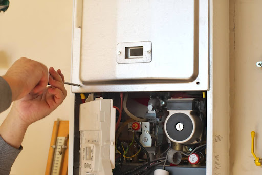 engineer working on boiler